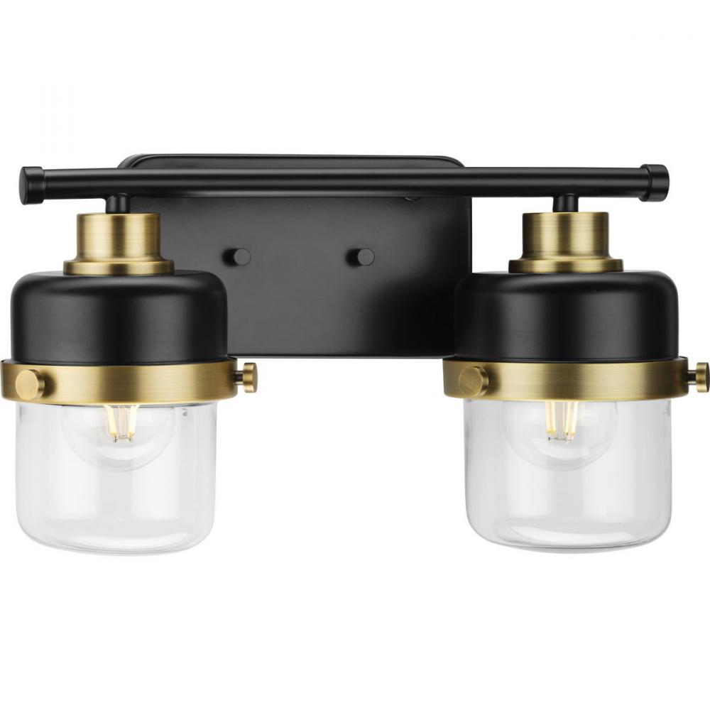 Beckner Collection Two-Light Matte Black Clear Glass Urban Industrial Bath Light with Vintage Brass